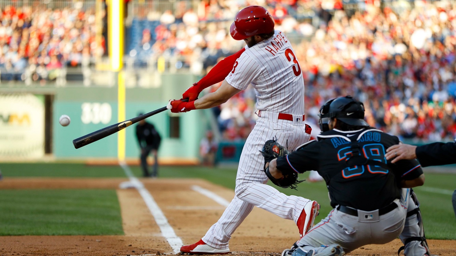 Mandatory Credit: Photo by Matt Slocum/AP/REX/Shutterstock (10220334g)
Bryce Harper, Jorge Alfaro. Philadelphia Phillies' Bryce Harper, left, hits a two-run double off Miami Marlins starting pitcher Trevor Richards during the second inning of a baseball game, in Philadelphia. At right is Marlins catcher Jorge Alfaro
Marlins Phillies Baseball, Philadelphia, USA - 27 Apr 2019